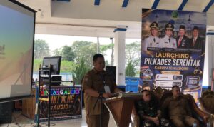 Herru Dana Putra,ST.,M.Ak Plt Kadis PMD Sa'at Membacakan Laporan Pelaksanaan Lounching Pilkades Serentak tahun 2026