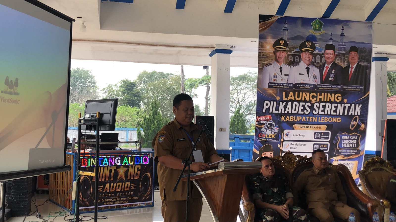 Plt Kadis PMD Sa'at Membacakan Laporan Pelaksanaan Lounching Pilkades Serentak tahun 2026